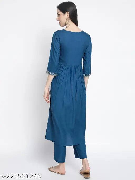 Rayon ethnic kurti plazo set, blue or red, perfect for weddings and occasions. Embroidered, A-line, three-quarter sleeves, hand washable, rayon fabric