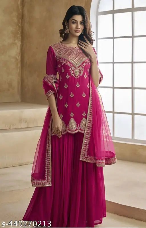 Ethnic motifs embroidered sequinned scalloped kurti with sharara & dupatta. Indian georgette fabric three-quarter sleeves. Single size S-XXL