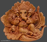 Brown resin Ganesh shoeflower idol, intricately carved with vibrant colors, perfect for car dashboard puja ghar or home decor