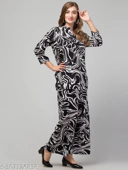 Black & White rayon printed top set with palazzo, women's fashion in three-quarter sleeves. Soft, lightweight rayon fabric with intricate design, machine washable