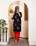 Rayon printed kurta set with palazzos, three-quarter sleeves and round neck. Trendy women's fashion for comfortable everyday wear, designed in India