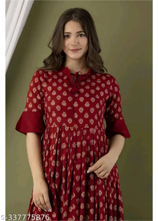 Stylish maroon rayon anarkali kurti, three-quarter sleeves, printed combo. Perfect for dinner parties or family gatherings. Indian traditional wear from Shanu Pari