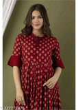Stylish maroon rayon anarkali kurti, three-quarter sleeves, printed combo. Perfect for dinner parties or family gatherings. Indian traditional wear from Shanu Pari
