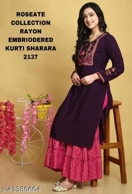 Purple embroidered rayon kurta with sharara, intricate design on display