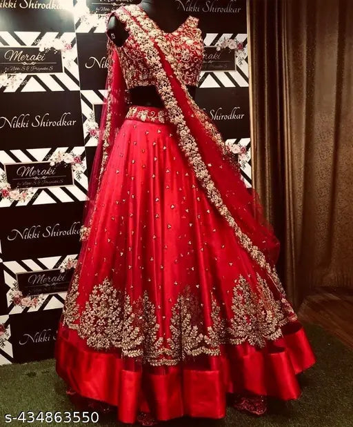 Designer satin-net lehenga choli set with embroidered dupatta, ideal for Indian party wear