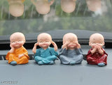 Multicolor ceramic Buddha statue set (4pcs), intricately crafted by Indian artists, ideal for home decor or gift