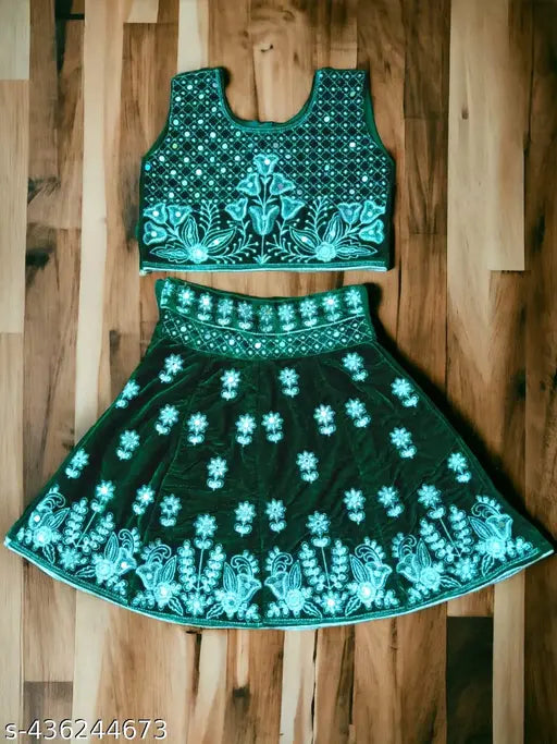 High-quality velvet lehenga set for women, sleeveless crop top with embroidered patterns, organza dupatta. Indian ethnic wear for special occasions like weddings and festivals. Available in sizes 0-3 months and 1-2 years. Comfortable to wear and customizable for bulk orders