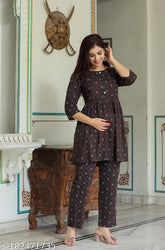 Soft cotton night suit with three-quarter sleeves, printed pattern, available in S, M, L, XL, XXL, XXXL. Indian-made comfortable sleepwear on display