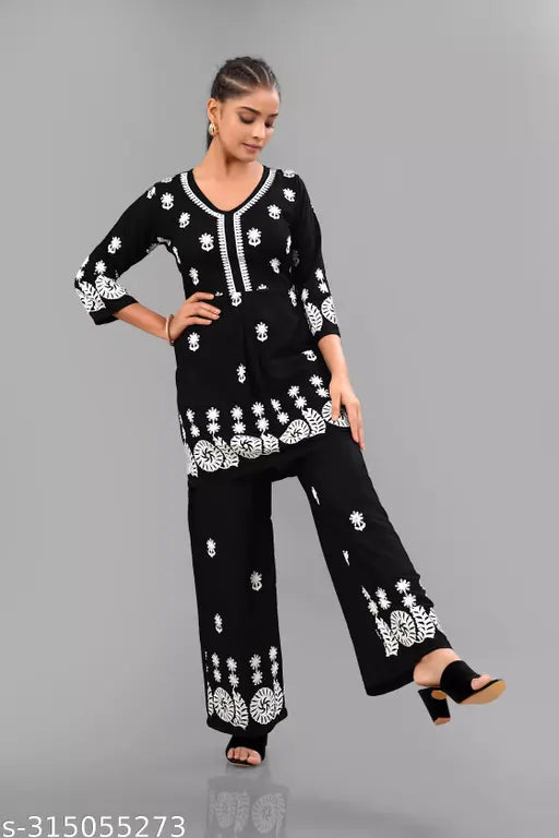 Black Bhavani Fashion Women's Rayon Printed Top and Palazzo Set with Embroidery and Sequins, suitable for party, wedding, or casual wear