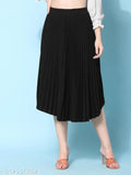 Black crepe pleated midi skirt, full-length, elastic waistband, flared hemline. Trendy, versatile, and comfortable for all body types. Perfect length for the average Indian woman. Made from wrinkle-free crepe fabric. Size XS (32W, 28L, 40H), India origin