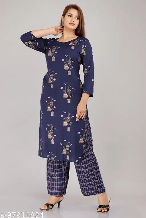 Rayon printed kurta palazzo set for women, three-quarter sleeve rayon fabric with net pattern on display stand, Indian ethnic wear for ladies in M, L, XL, XXL sizes