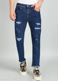 Dark blue cotton blend ripped jeans for men, funky designer look with raw wash