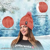 Pink wool knit beanie hat with fleece lining and bobble pom pom, perfect for outdoor sports and winter wear