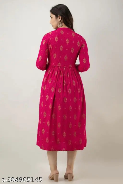 Rayon printed mirror work long kurta with embroidery, women's festive Indian attire on mannequin