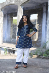 Rayon print kurta suit set with dhoti panit for girls, three-quarter sleeves in various sizes from 5-6 years to 12-13 years. Indian fashion for children