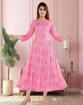 Pink Rayon A-Line Anarkali Kurti with Sequins, flared design, trendy printed pattern for women's partywear. Sizes: S (36in bust, 47in length), M (38in bust, 47in length), L (40in bust, 48in length), XL (42in bust, 48in length), XXL (44in bust, 48in length). Hand-dyed and hand-beaded in India
