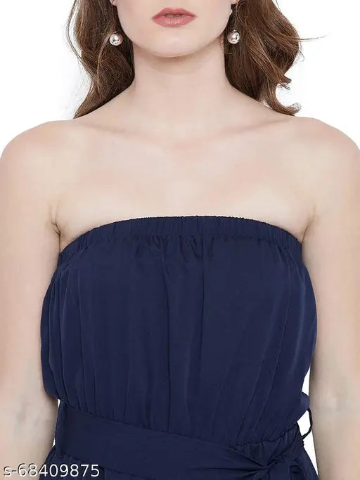 Green polyester off-shoulder sleeveless jumpsuit, solid design, size S, two pockets, belt included - Epoca jumpsuit on model (S: 34-40-28-36)