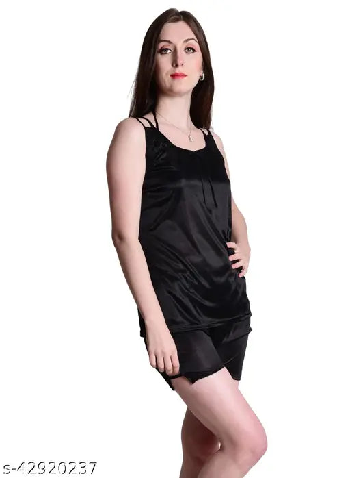 Black satin nightwear top & shorts set, sensual and stylish sleepwear on bedroom display