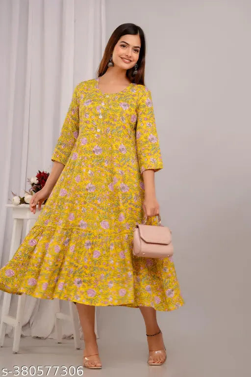 Stylish rayon printed flared Anarkali kurta with three-quarter sleeves, vibrant Indian fashion on model