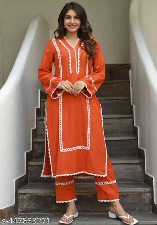 Trendy heavy rayon lace kurta set with palazzos, solid net design, long sleeves, perfect for various occasions