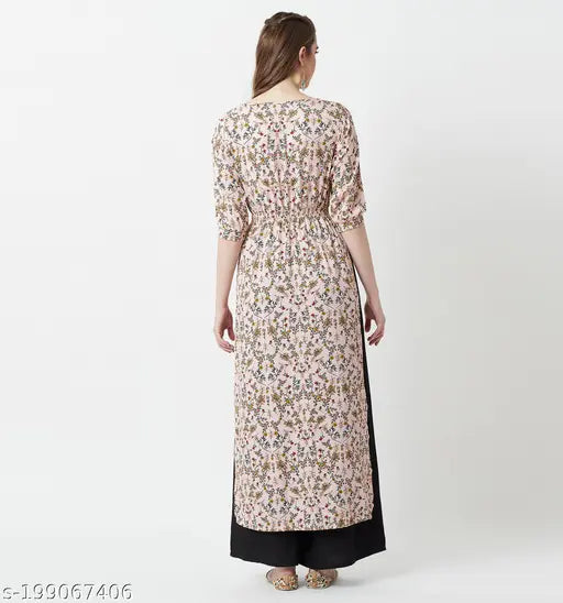 Multicolor peach floral maxi top with round neck, 3/4 sleeves, tassel detailing & front slit. Indian-made women's fashion