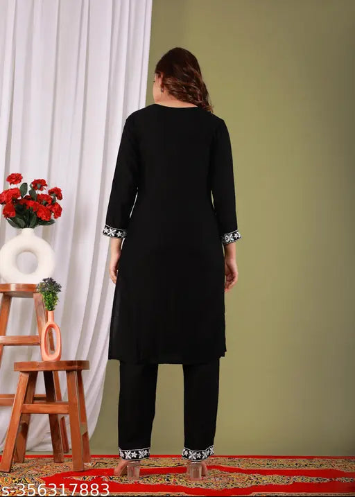 Rayon embroidered kurti set with pant and dupatta, features three-quarter sleeves, available in L, XL, XXL, XXXL, 4XL. Indian designer ladies fashion