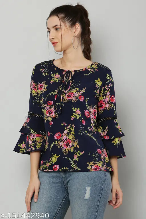 Trendy navy crepe three-quarter sleeve top with floral print, tie-up neck, and layered sleeves for women's garments - stylish casual wear for various occasions, made in India