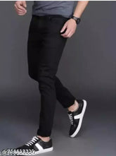 Black, denim fashionista mens jeans with waist closure button, clean wash, and soft n comfort. One quantity, solid pattern, black color, manufactured in India. Sizes: 28 (in), 30 (in), 32 (in), 34 (in)