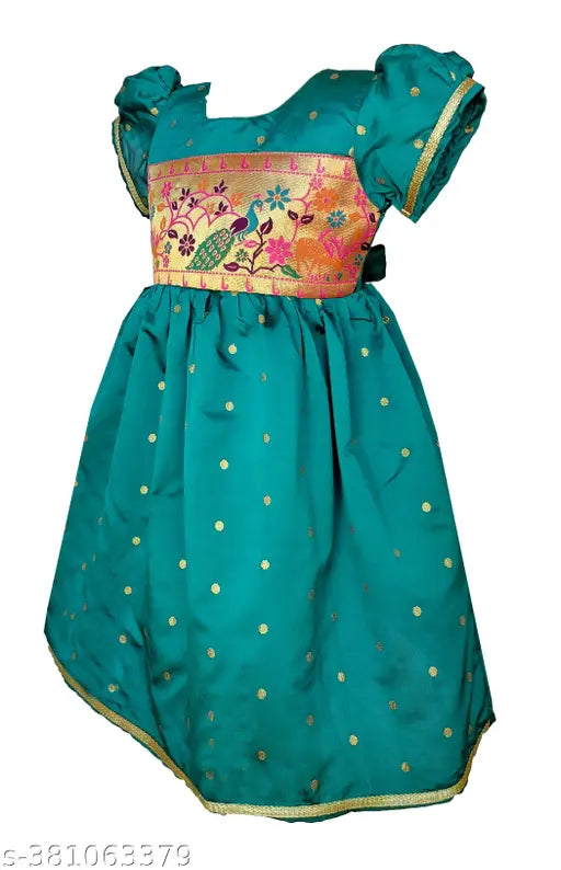 Green silk Paithani strap for toddler clothing, intricate printed net pattern on display