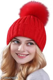 Assorted color womens winter woolen beanie cap with fur pom-pom, keeps head, ears, and neck warm - India