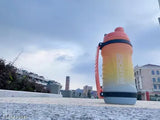 Orange BPA-free large gallon jug, leakproof water bottle for camping, sports, workouts (2500ml) - ideal for measuring daily intake and fitness goals, humanized design with adjustable handle and one-piece cup lid