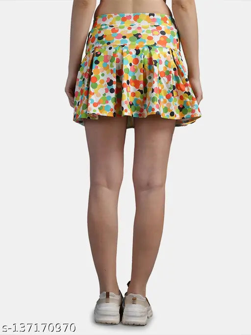 Polyester printed mini skirt with attached inner shorts, plaid design and elastic waistband, perfect for casual wear or skateboarding. Available in sizes 28, 30, 32, 34, and 36. Made in India