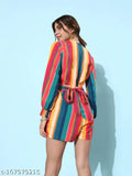 Multi-colored printed polyester jumpsuit with long sleeves and waist tie, Style Quotient Women on model