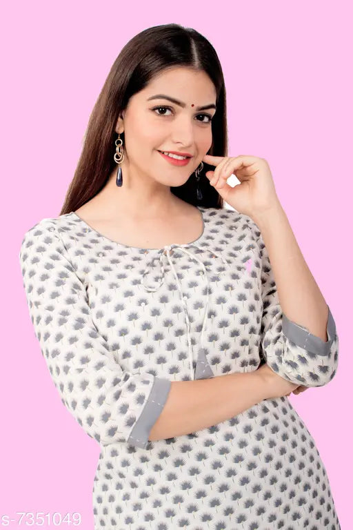Women's cotton A-line printed long kurti with palazzos, three-quarter sleeves, single piece in S, M, L, XL sizes. Indian handcrafted ethnic wear on mannequin