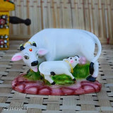 Polyresin Kamdhenu Cow and Calf Statue, vibrant spiritual showpiece from Haridwar, India (12cm x 10cm x 7cm)
