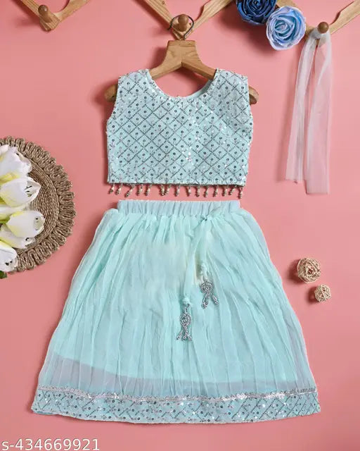 Vibrant chiffon Lehanga Cholis set, intricately embellished, perfect for festive occasions. Indian kids' ethnic wear in premium quality fabrics