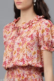 Pink printed polyester top with casual puff sleeves, short sleeve length. Women's size M, XS-XXXL. Made in India