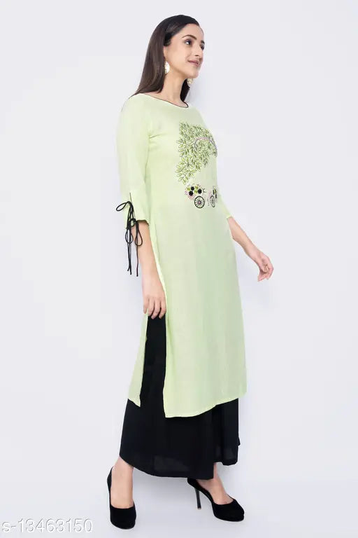 Embroidered rayon straight kurta, three-quarter sleeves. Indian women's fashion with intricate embroidery detail