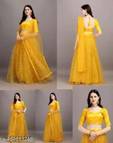 Yellow semi-stitched net lehenga choli with floral embellishments and classic blouse, India