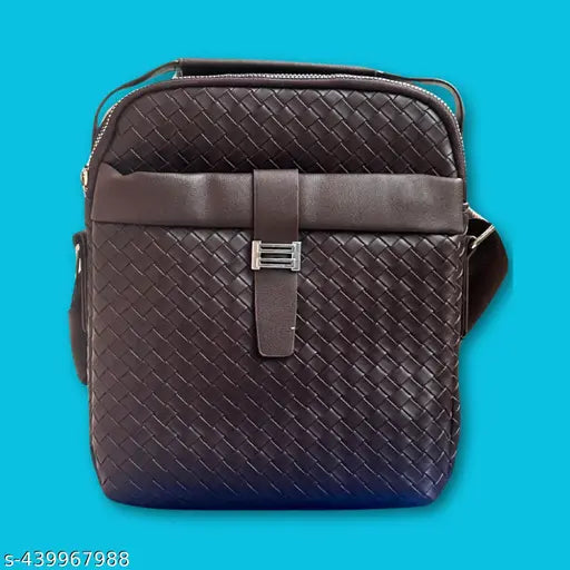 Canvas & leather crossbody sling bag with adjustable strap, ideal for travel or daily use by men and women. Textured net pattern, free size (8 in x 3 in x 9 in), originating from India