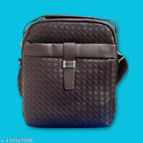 Canvas & leather crossbody sling bag with adjustable strap, ideal for travel or daily use by men and women. Textured net pattern, free size (8 in x 3 in x 9 in), originating from India