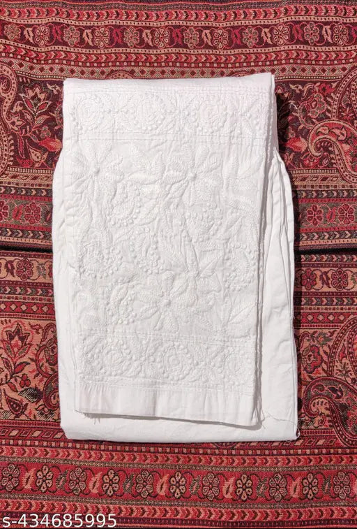 Chikankari stretchable cotton-lycra pant, embroidered net, elasticated waist, 2 pockets, modern design for women's fashion. Hand or machine wash, fully elasticated waist, pairs well with kurtis. Made in India