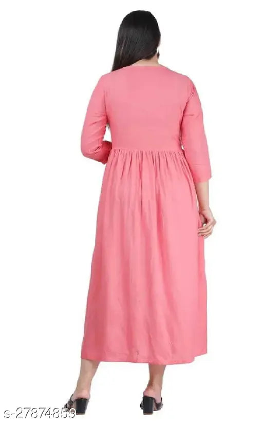 Peach rayon flared kurta set, traditional embroidered women's wear with three-quarter sleeves. Indian ethnic party dress for special occasions