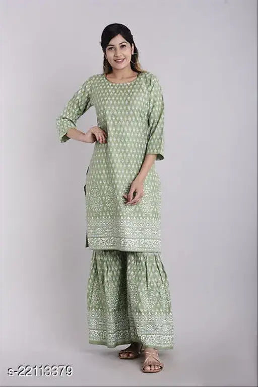Rayon one-stitched kurta and sharara set, printed net three-quarter sleeves Indian outfit on mannequin