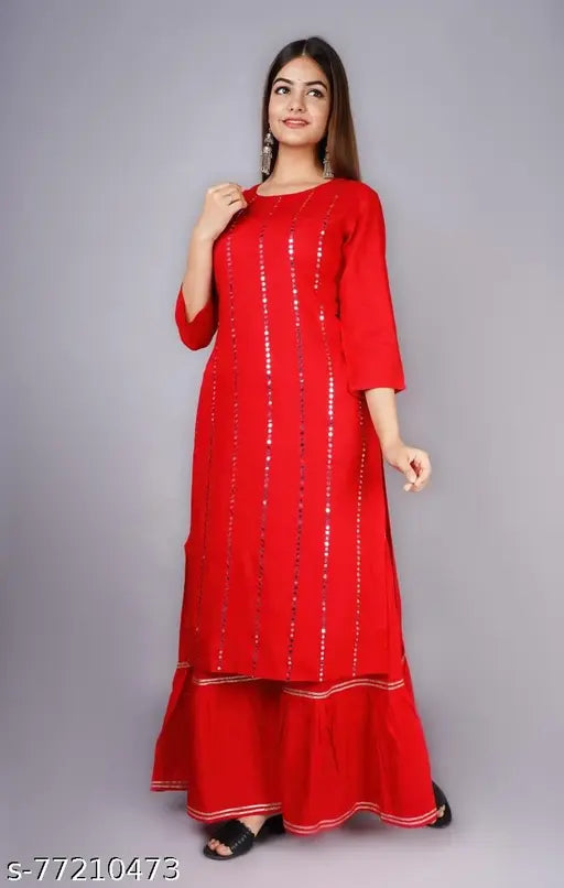 Solid color rayon kurta and sharara set, three-quarter sleeves, embellished net pattern, Indian fashion