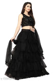 Vaksha black net ceremonial wear A-line lehenga with sequined unstitched blouse. Indian semi-stitched lehenga set featuring embellished top and solid dupatta