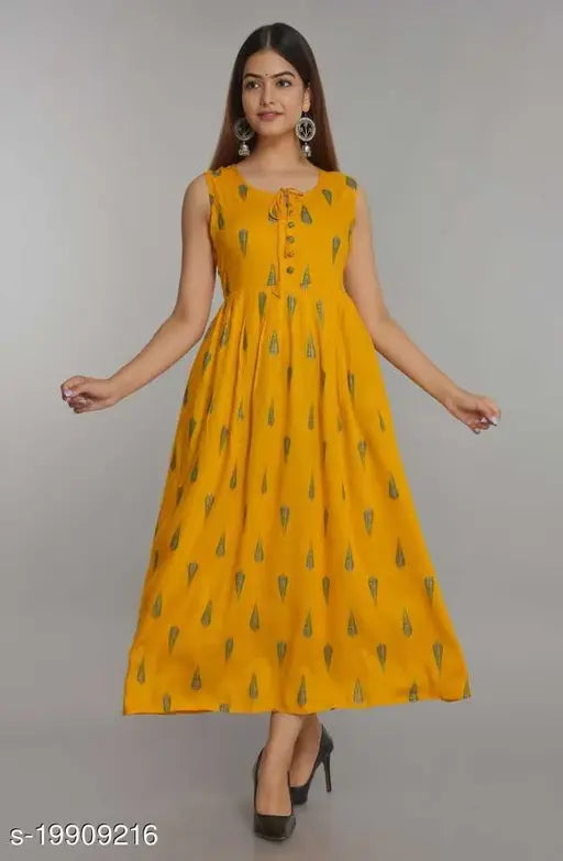 Women's yellow rayon pleated printed kurti, sleeveless, Indian fashion on hanger