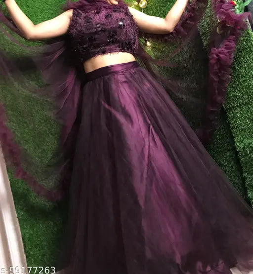 Wine-colored flared jute silk and net partywear lehenga choli set, featuring a wine-colored blouse with wine ruffles and matching dupatta. Indian Western style for women and girls, free size