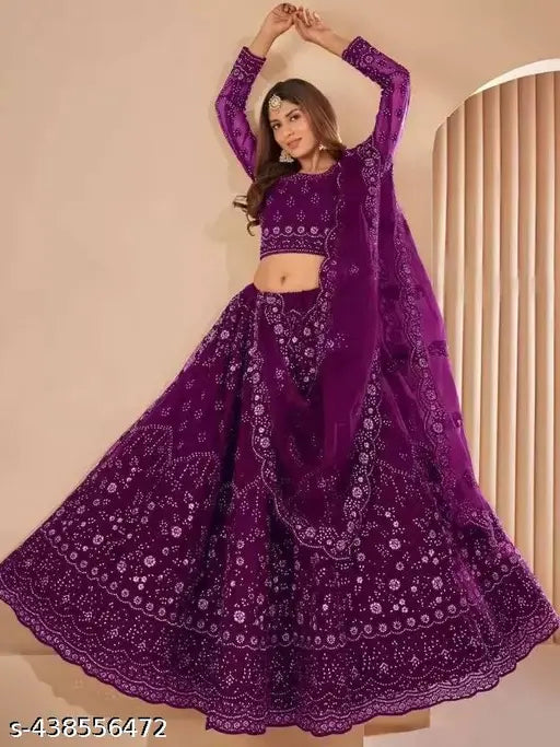 High-quality embroidered net lehenga choli for women, free size. Indian ethnic wear for parties and weddings