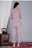 Women's rayon pink printed night suit top & pyjama coord set with floral print, round neck, and three-quarter sleeves. Soft and comfortable sleepwear made in India